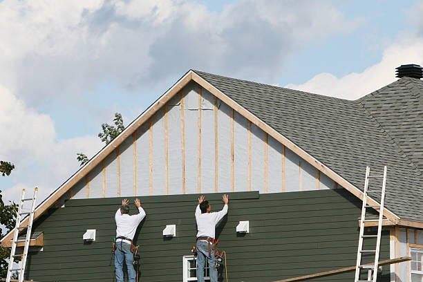 Professional Emergency Siding Repair technician working in Nevada, OH
